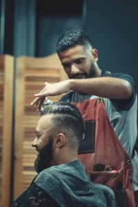 A barber is required to work in a salon inside a mall in Abu Dhabi